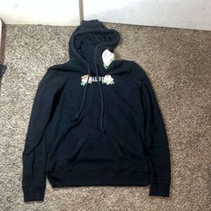 Black Hollister sweatshirt with flower detailing woman’s Medium